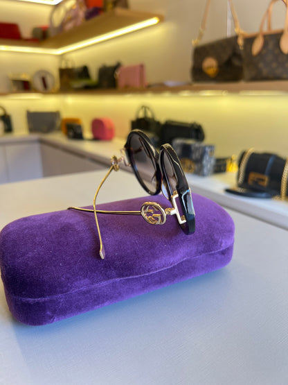 Óculos de Sol Gucci Round Interlock