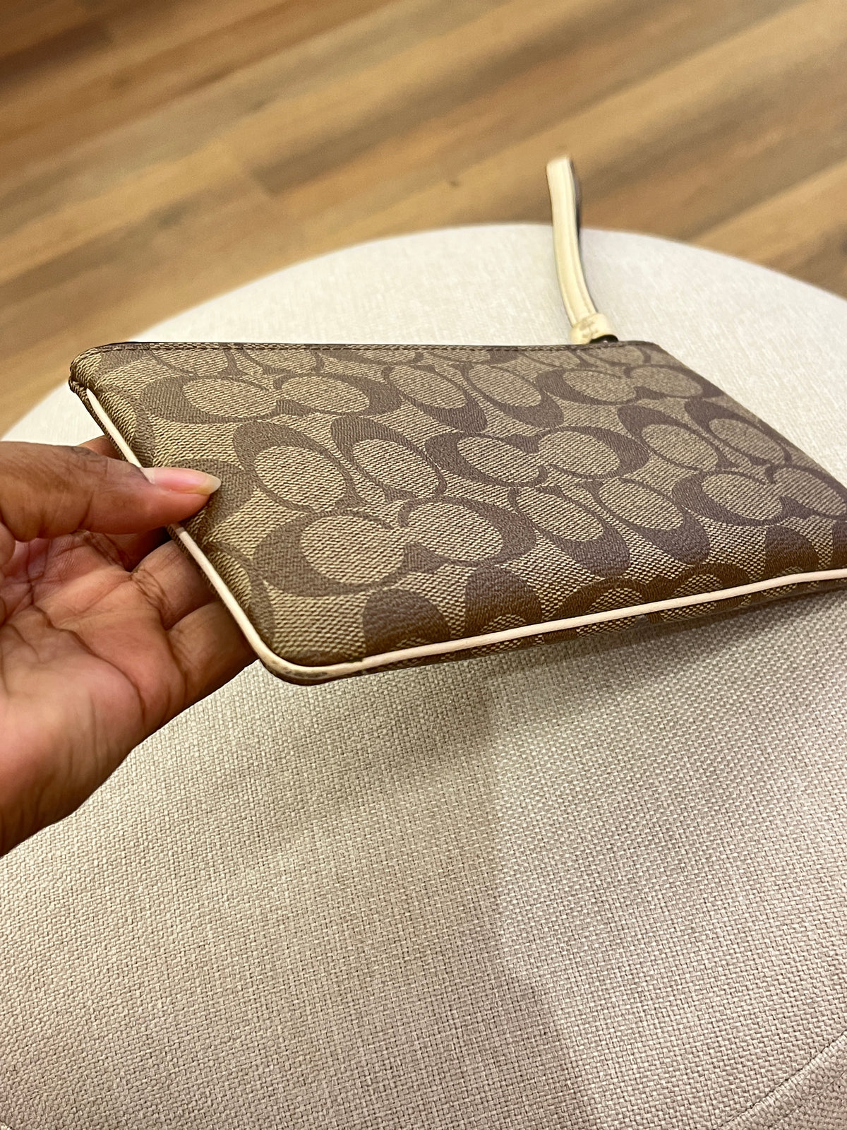 Pochette Coach Monograma