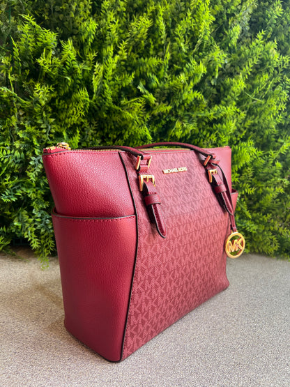 Michael Kors Charlotte Shopping Logo