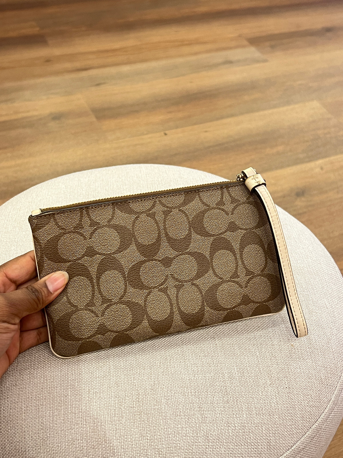 Pochette Coach Monograma