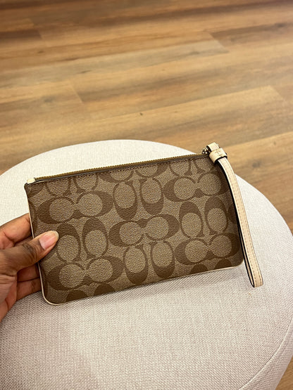 Pochette Coach Monograma