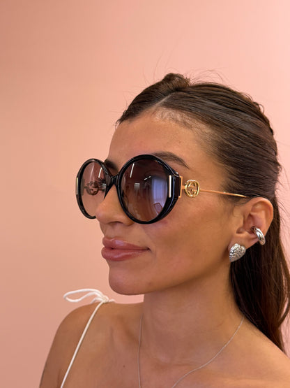 Óculos de Sol Gucci Round Interlock