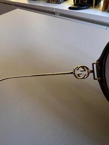 Óculos de Sol Gucci Round Interlock