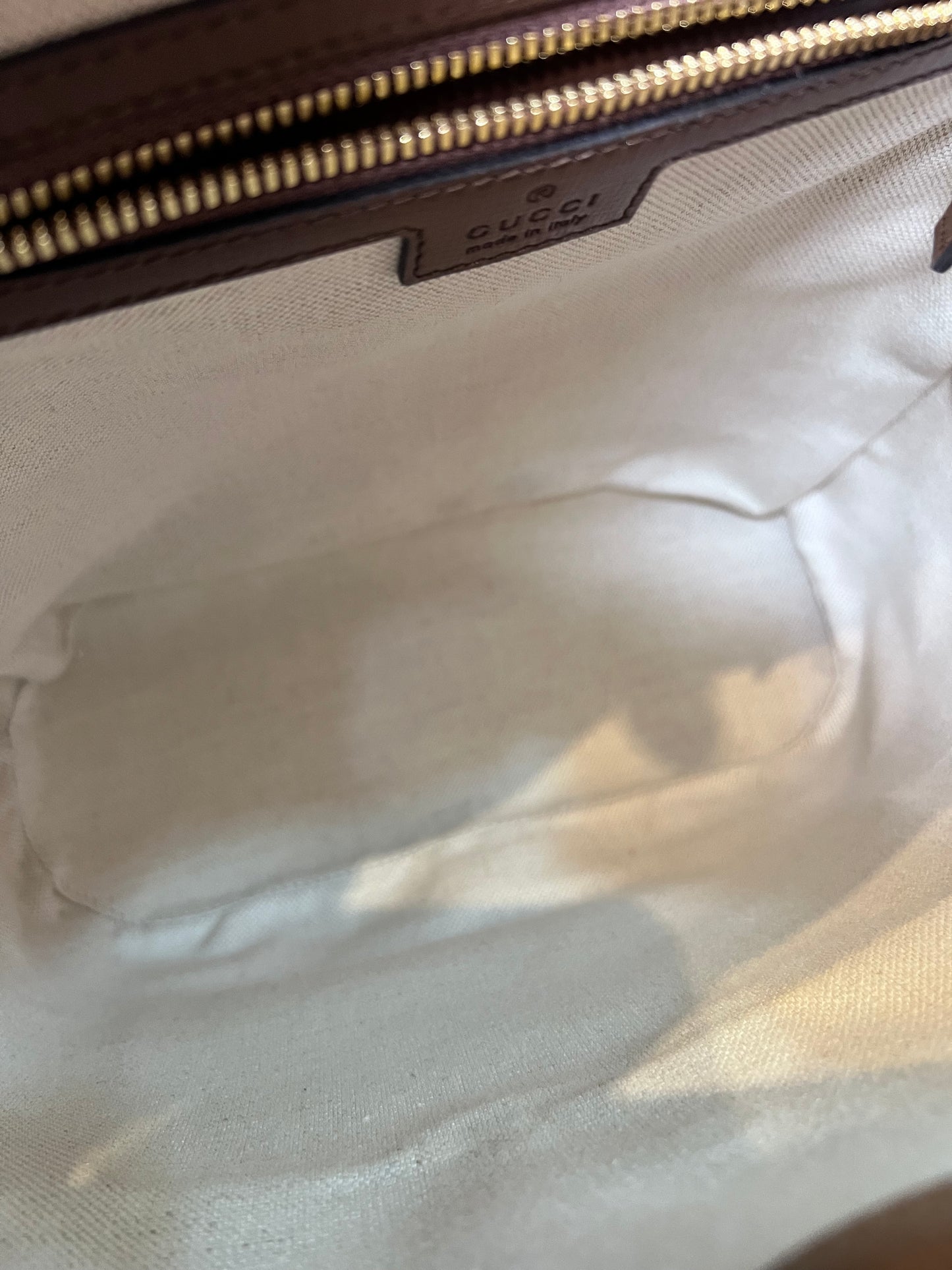 Mochila Gucci Monograma