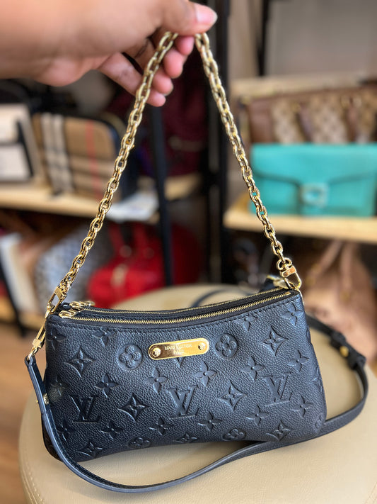 Louis Vuitton Pochette Liv Couro