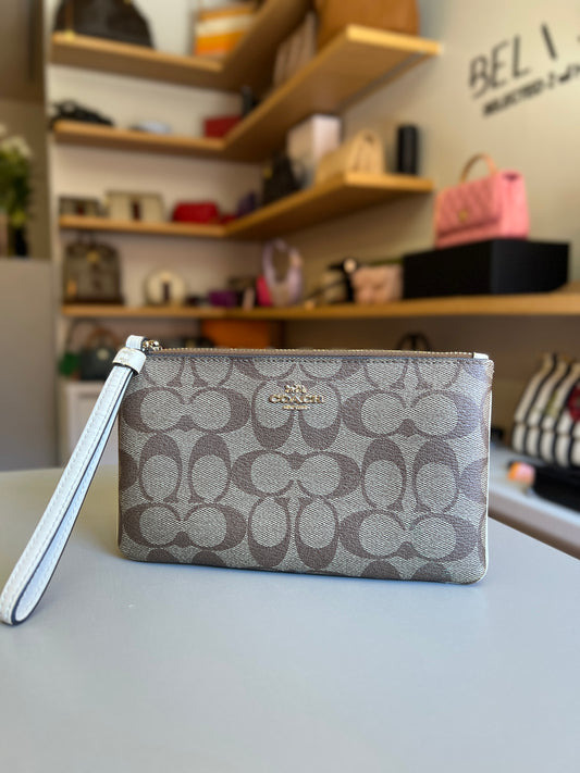 Pochette Coach Monograma