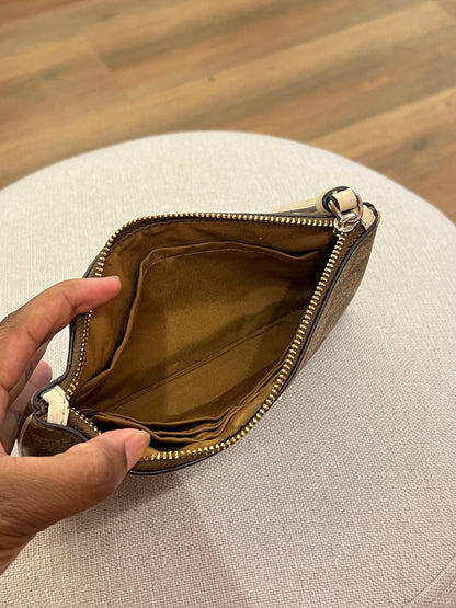 Pochette Coach Monograma