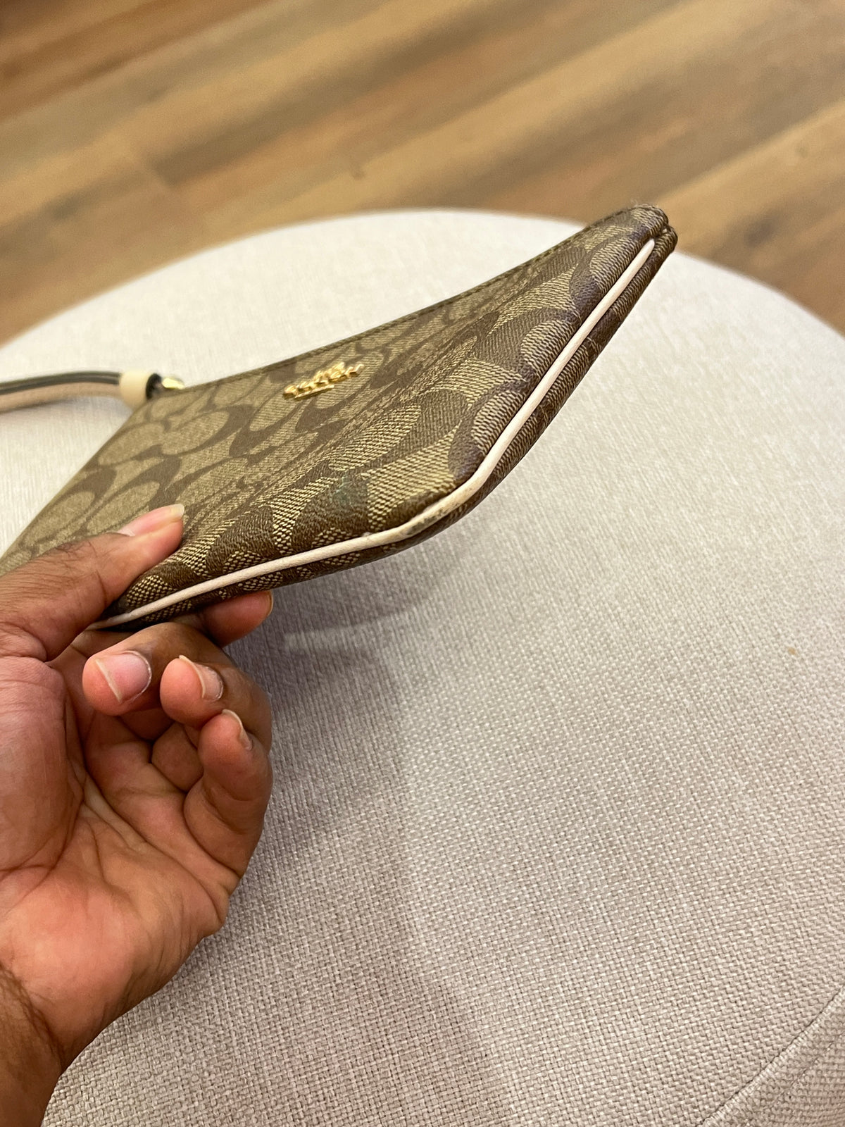 Pochette Coach Monograma