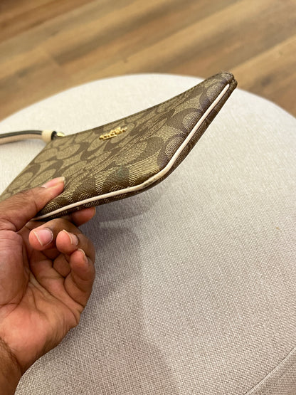 Pochette Coach Monograma