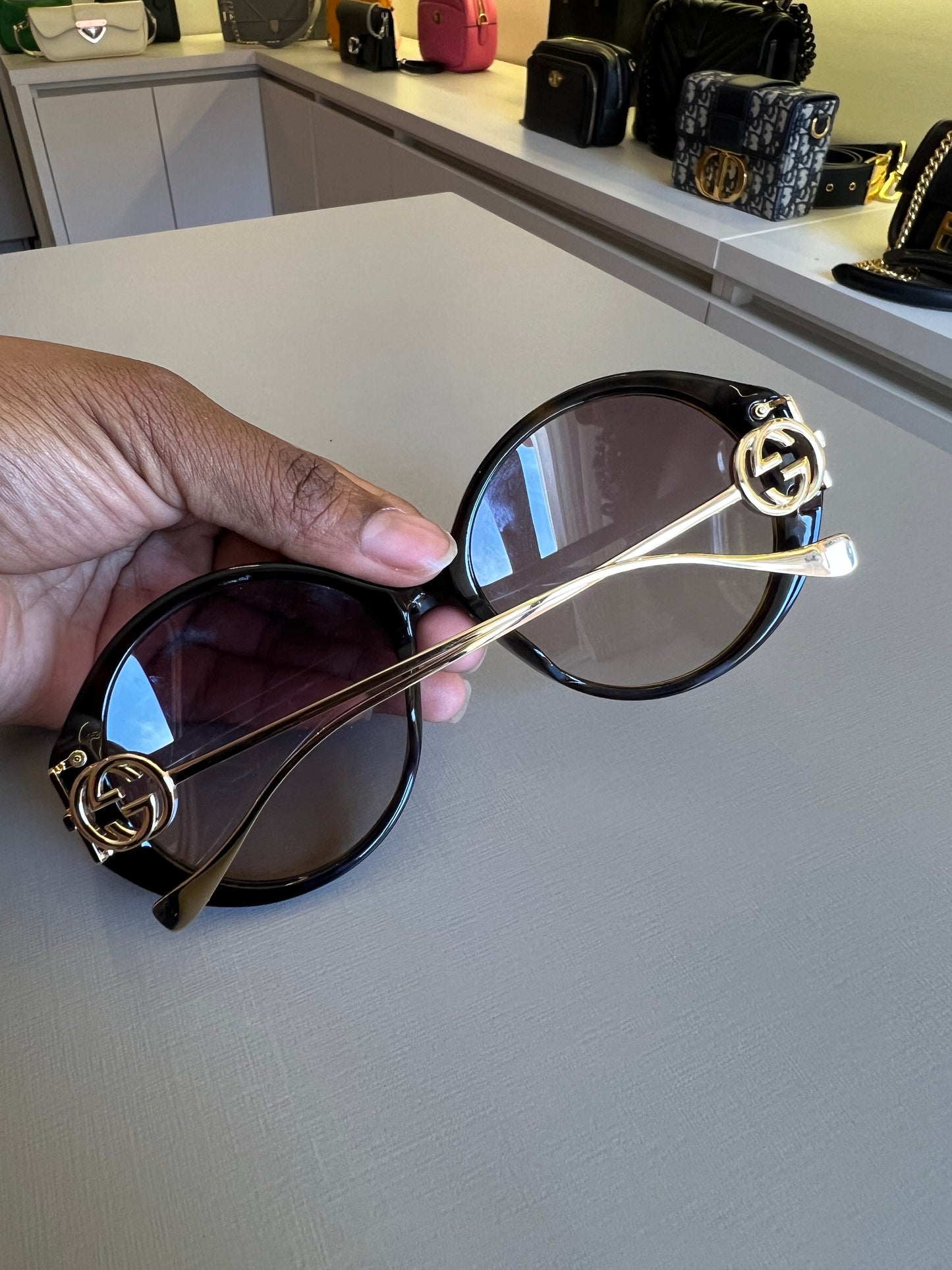 Óculos de Sol Gucci Round Interlock