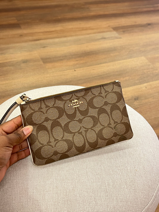 Pochette Coach Monograma