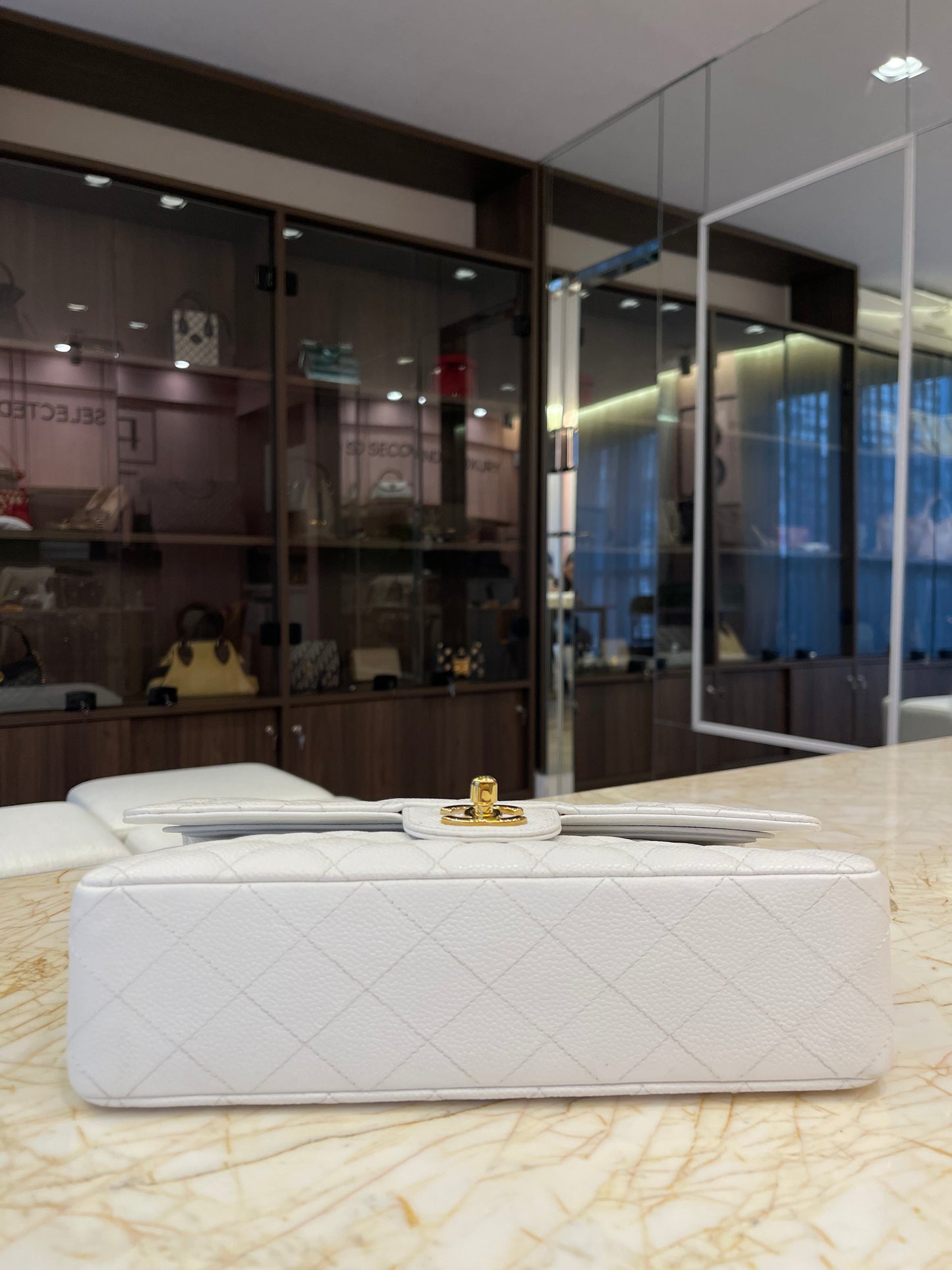 Chanel Classic Double Flap em Couro Caviar Branco