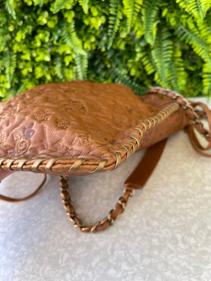 Chanel Floral Embossed Leather Marrom
