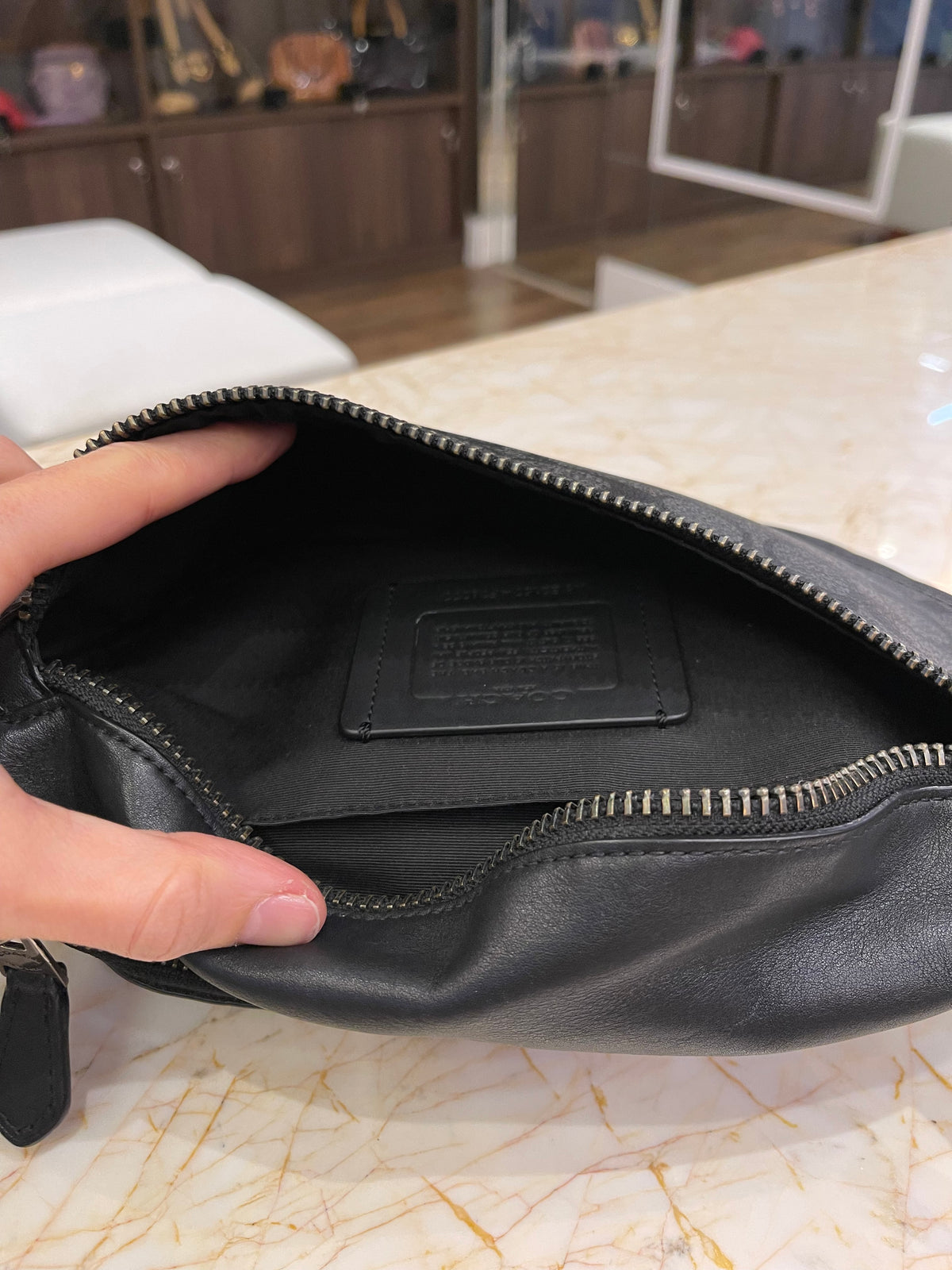 Pochette Coach Warren Belt Signature