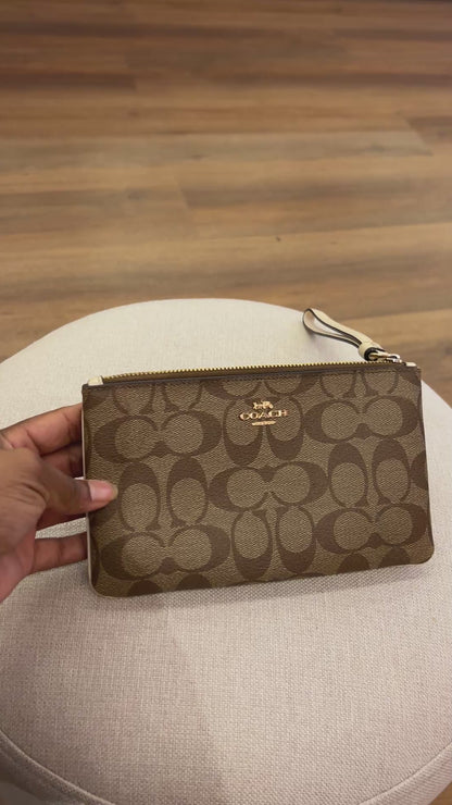 Pochette Coach Monograma
