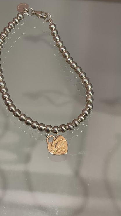 Pulseira Tiffany & Co Heart em Prata e Ouro Rosê